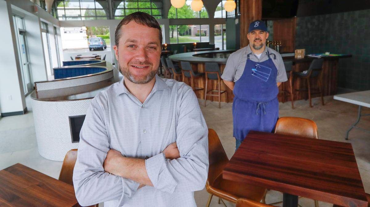 Tory DeMarce, left, is the owner of The Belmont in Wichita.