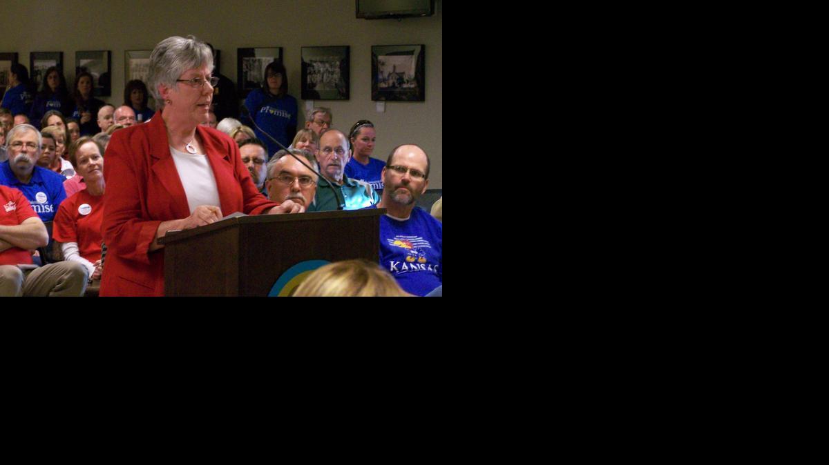 Retired teacher Leota Coats tells state legislators at a Derby forum Monday that the recently passed school finance law eliminating state-mandated due process hearings for teachers is ill-advised. She was dismissed in 1980 after flunking a star football player at Wellington High School, fought it to the Supreme Court and won.


