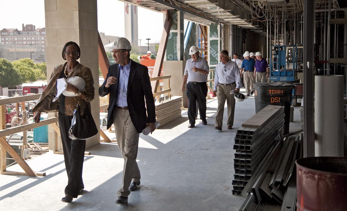 Wichita City Council member Lavonta Williams and city manager Robert Layton tour the Robert D. Love YMCA Downtown Branch under construction Friday, June 29, 2012.