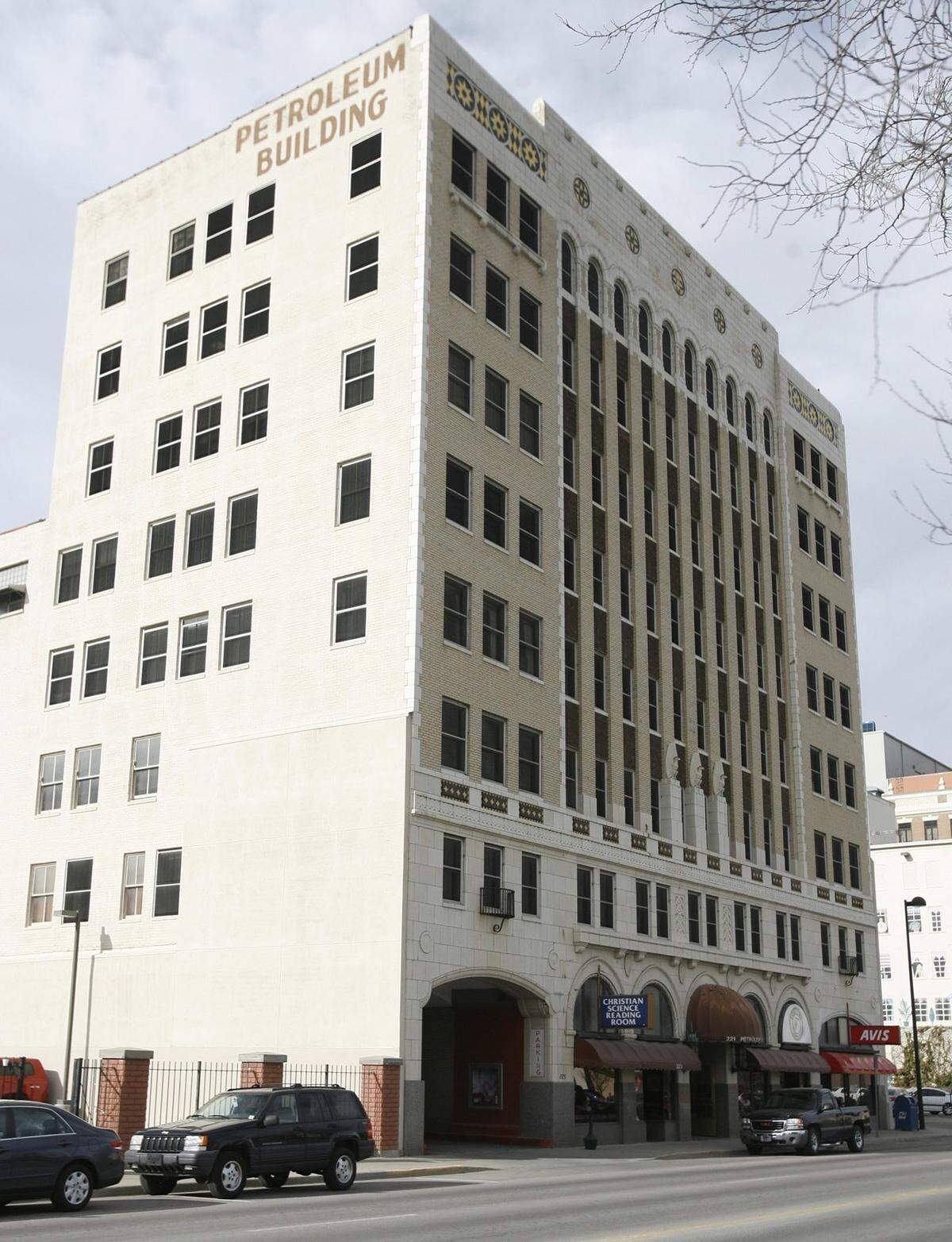 The Petroleum Building, which features a sunflower motif along the top front of the building, may become home to a hotel along with the former O’Rourke Title Building across a parking lot.