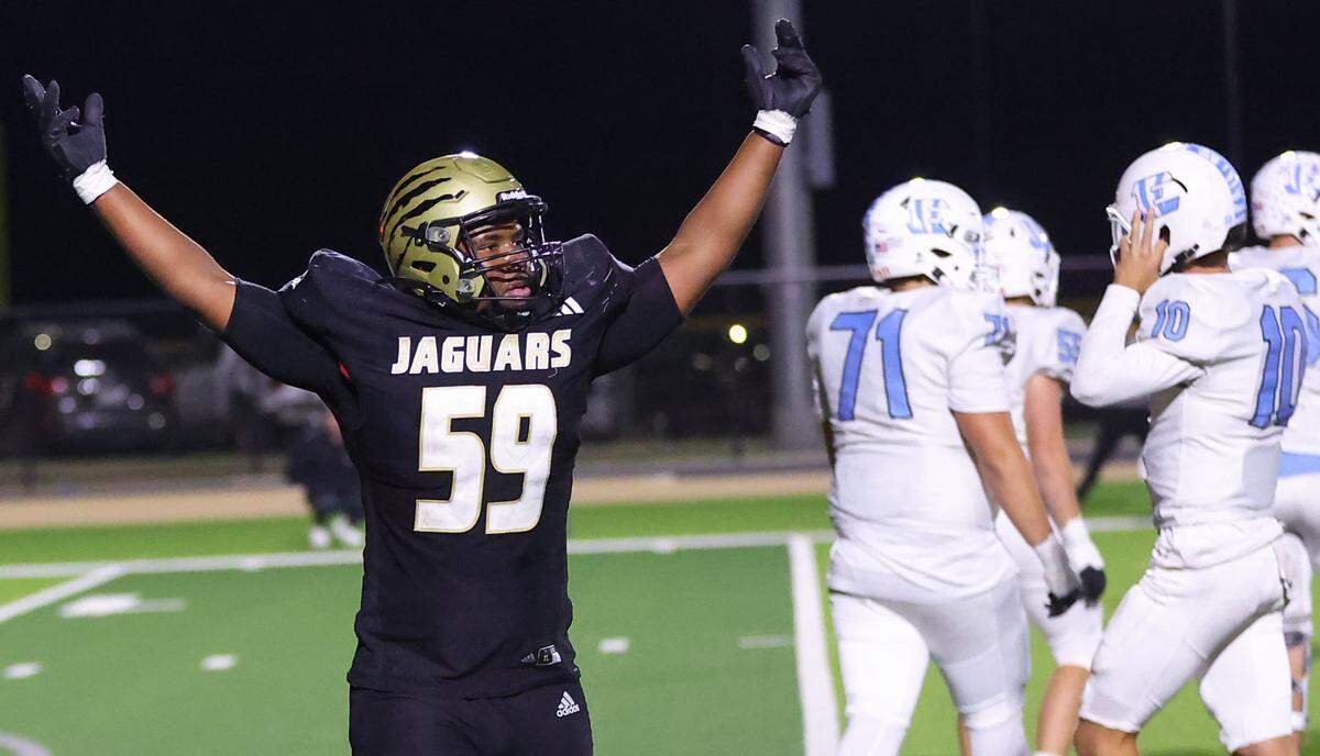 Andover Central junior Jaylen Wilson celebrates during a 27-26 victory over Eisenhower in a battle between ranked foes in the AV-CTL Division II.