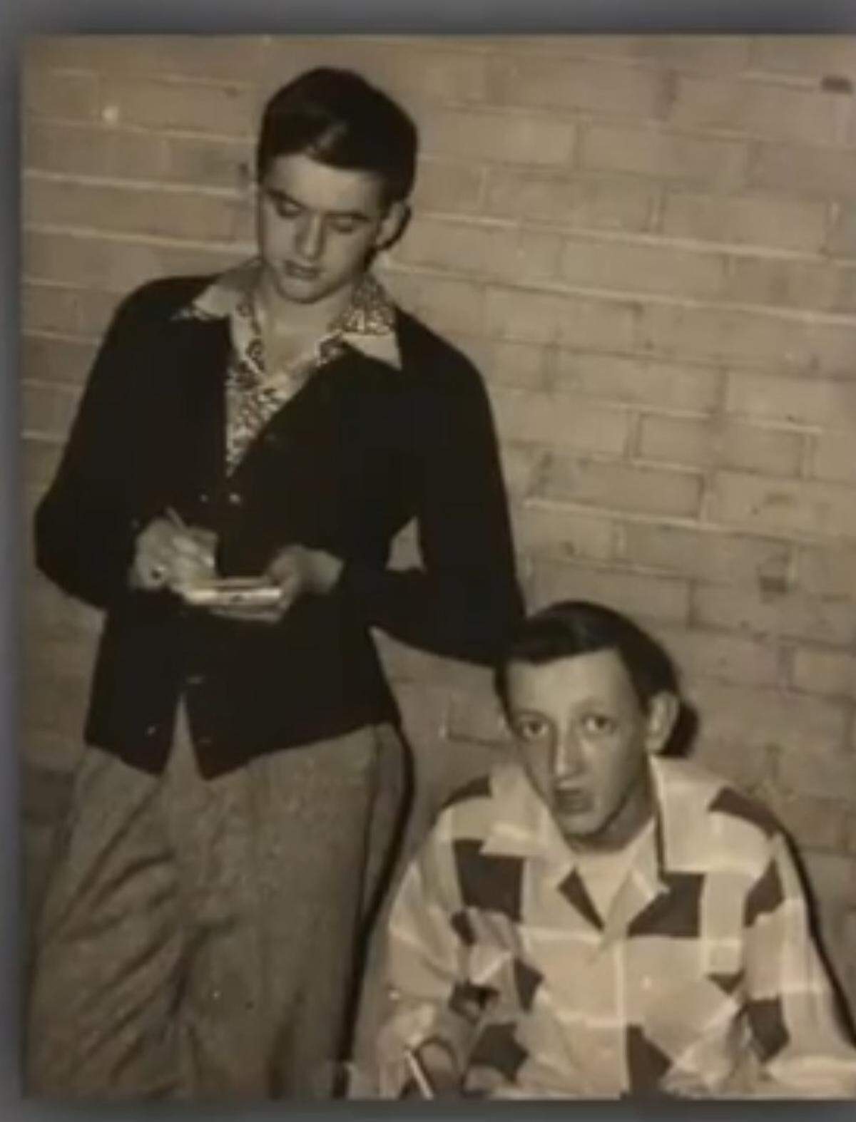 Iowa native Jim Rhatigan, left, received his bachelor’s degree in American history at Coe College in Cedar Rapids.