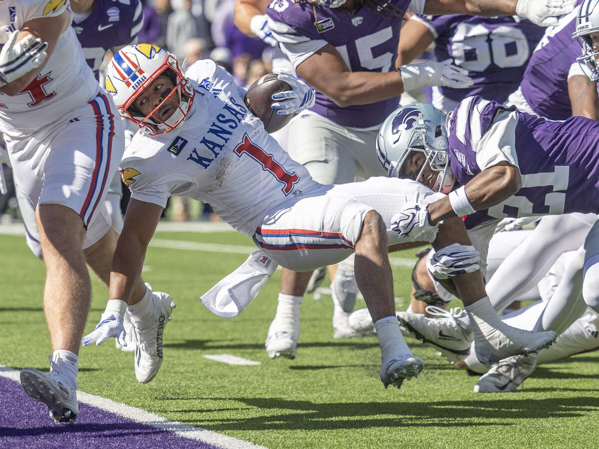 Kansas running back Dylan Edwards scores a touchdown on the opening drive of the second half on Saturday in Manhattan.