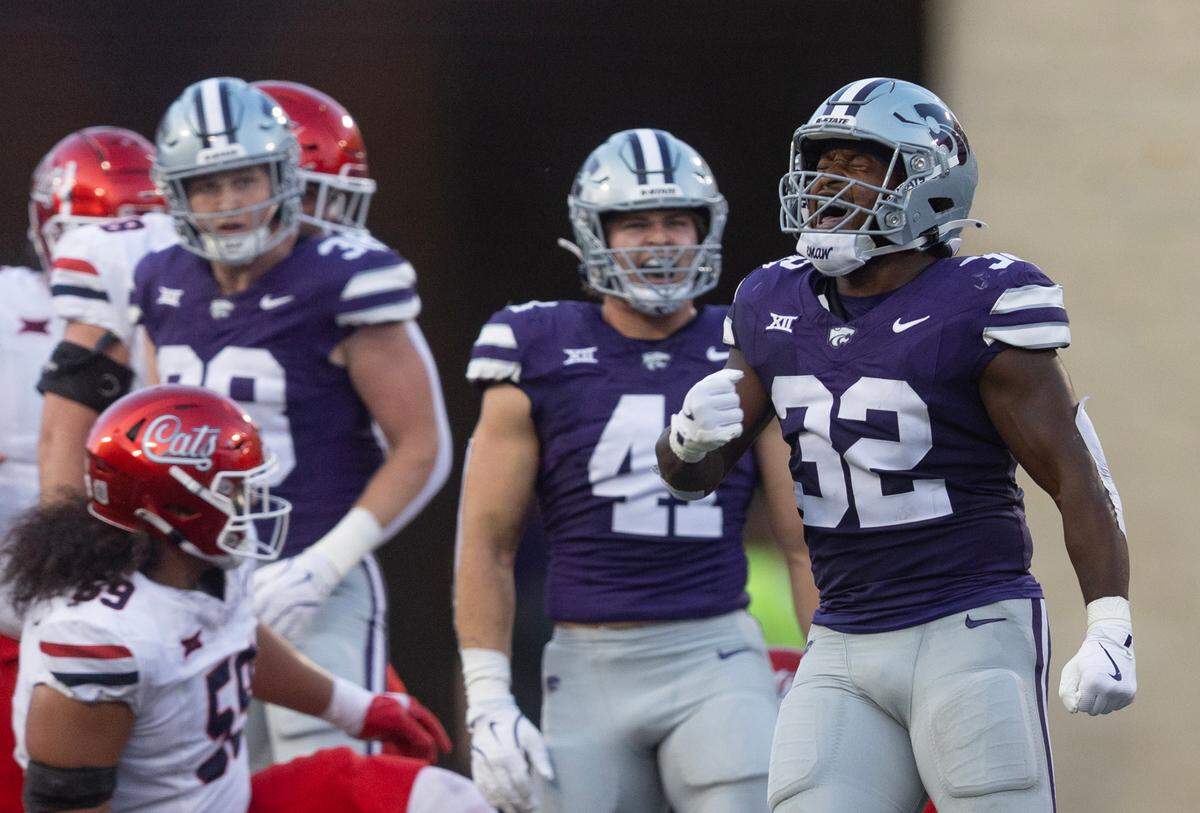 Kansas State’s Desmond Parnell celebrates a tackle for a loss during the first quarter of their game against Arizona on Friday night at Bill Snyder Family Stadium.