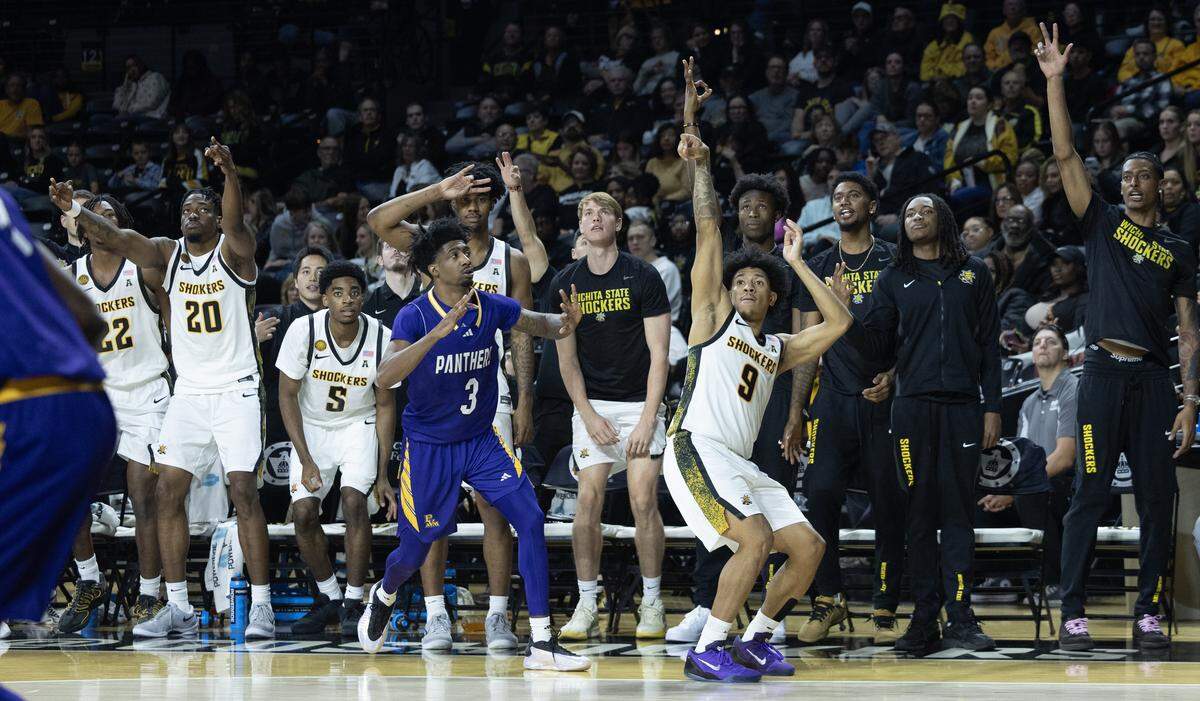 Wichita State’s Michael Gray Jr. waits to see if his three pointer falls during the second half against Prairie View A&M on Saturday at Koch Arena.