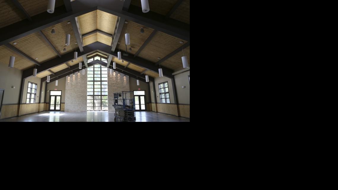 Botanica’s new events center looks up to a giant hackberry outside the vaulted window.

