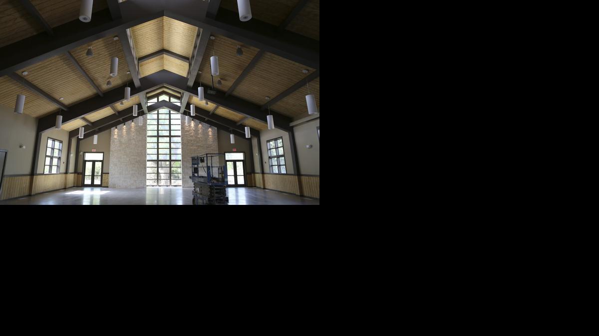 Botanica’s new events center looks up to a giant hackberry outside the vaulted window.

