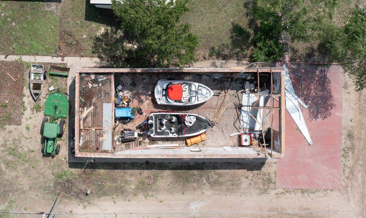 Damage in Halstead was extensive after a storm packing winds near 100 miles per hour, and possibly a tornado, struck the area on Sunday night.