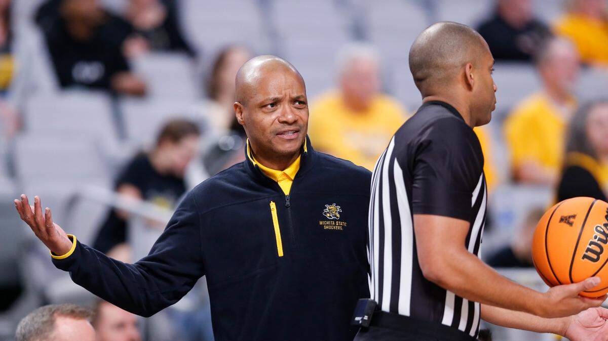 Wichita State coach Isaac Brown question a call during the second half of their first round game against Tulsa at the American Athletic Conference Tournament in Fort Worth on Thursday.