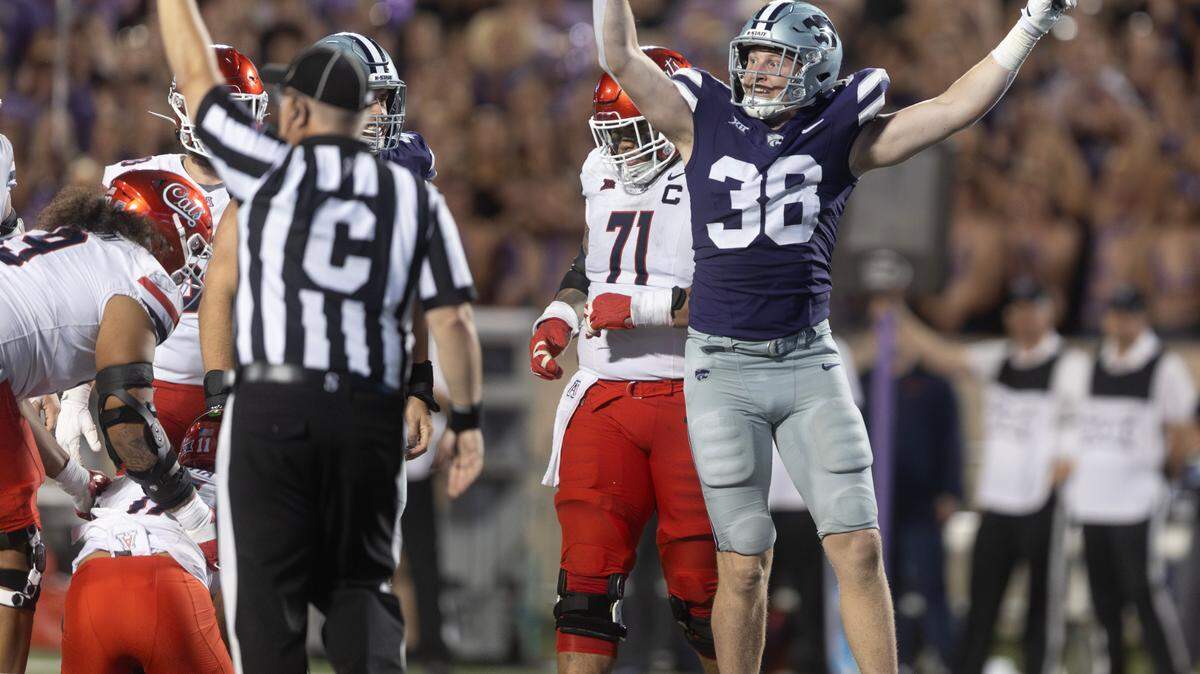 Kansas State’s Brendan Mott celebrates after sacking Arizona quarterback Noah Fifita during the third quarter of their game on Friday night at Bill Snyder Family Stadium.