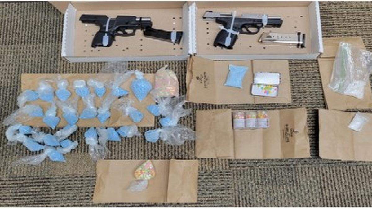 A man and woman were taken into custody after a search warrant turned up thousands of pills thought to be fentanyl inside a Salina home on Tuesday.