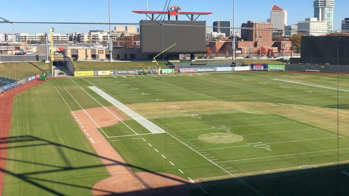 The final touches of the transformation of turning the baseball diamond at Riverfront Stadium into a football field for Sunday’s Kansas Jayhawk conference championship game were made this week.