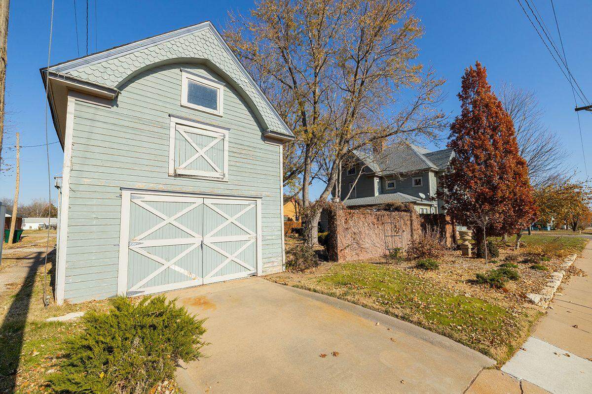 This historical home up for auction in March includes a carriage home.