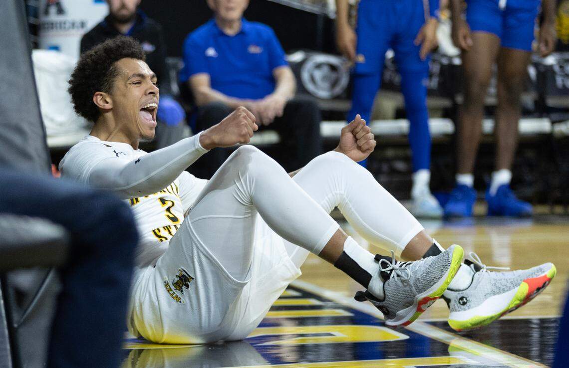WIchita State’s Craig Porter Jr., celebrates a basket and a foul during the first half of their game against Tulsa on Saturday.