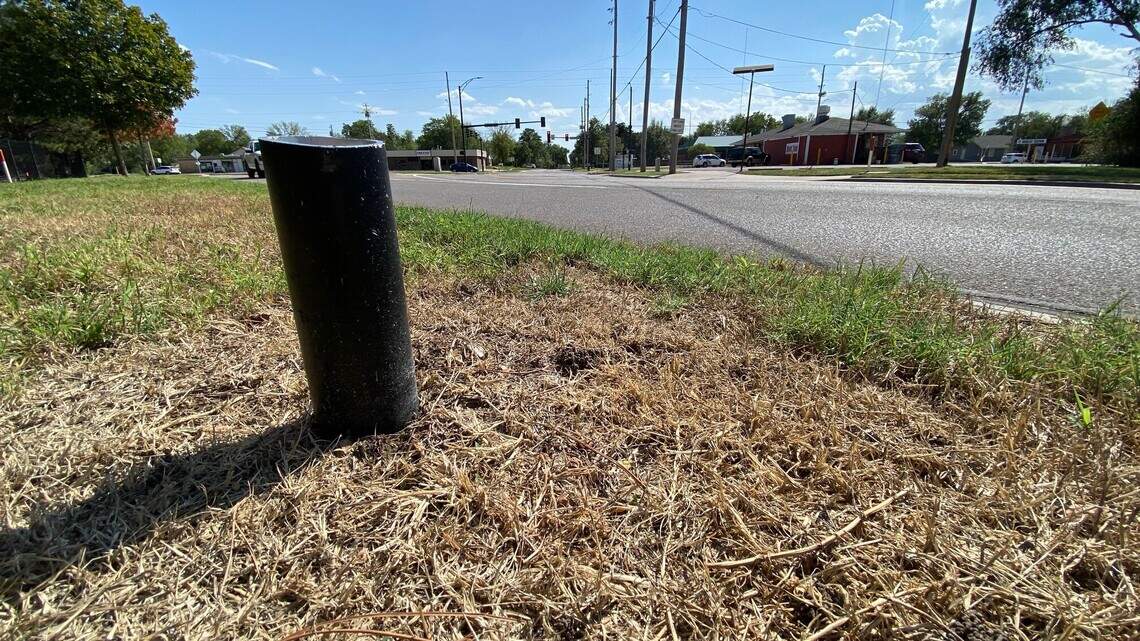 Police investigate after west Wichita Flock camera cut down