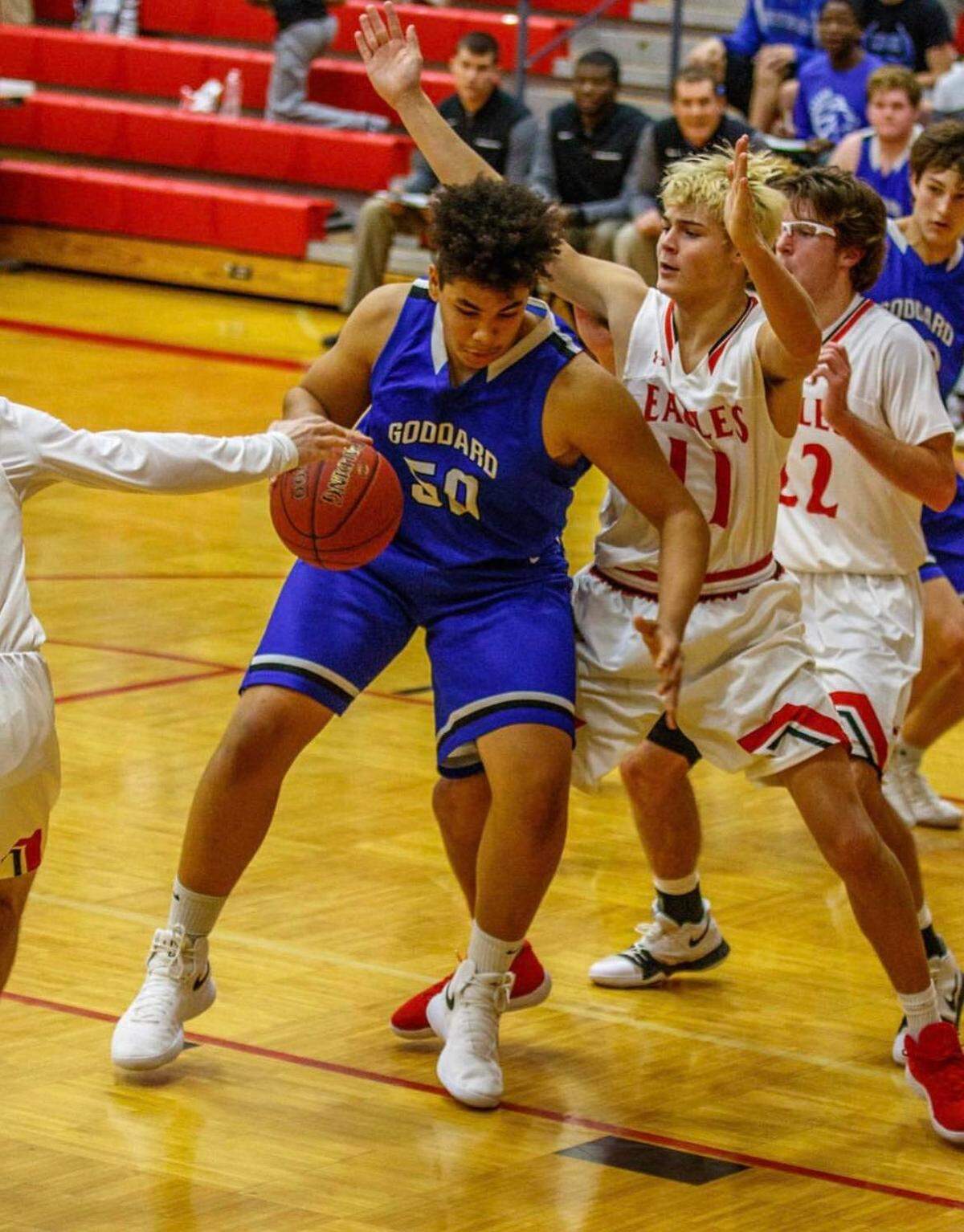 Jeremiah Crawford was the starting center on the Goddard basketball team his senior year. He always considered himself a basketball player more than a football player growing up.