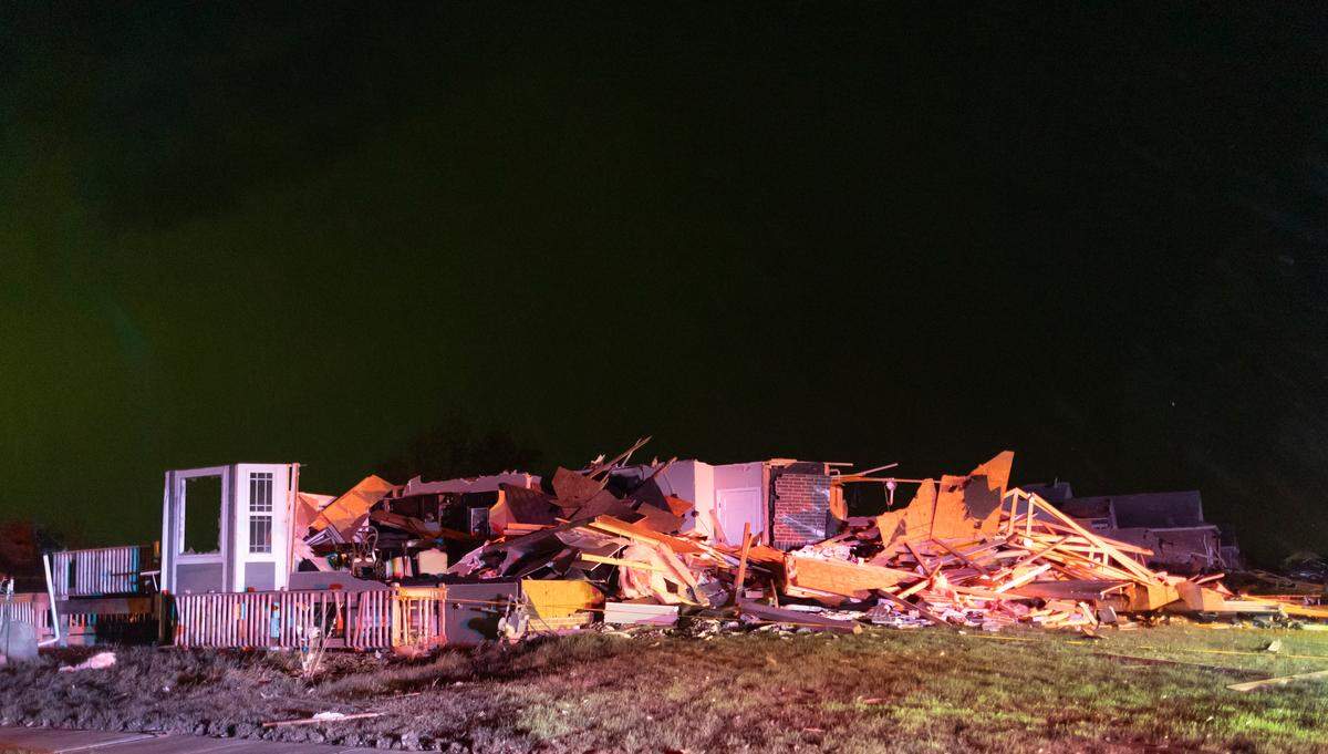 A heavily damaged home on east Minneha Ave. in Andover on Friday night after a tornado ripped through the area.