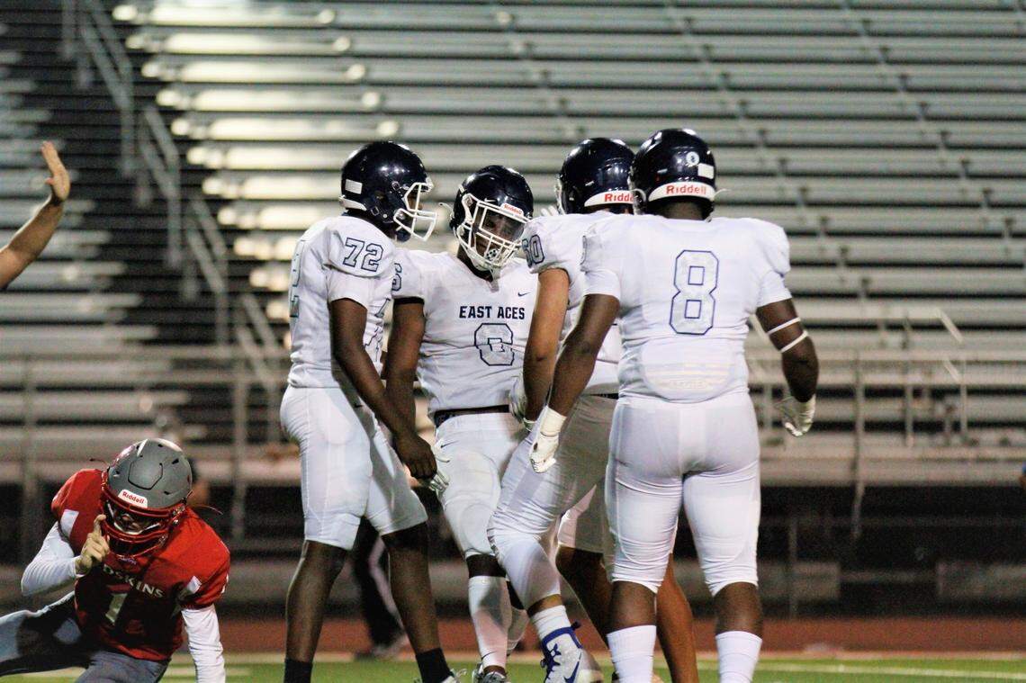 Wichita East’s Damien Schneider, Brenden Barley, Shyheem Parker and Darius Cooper