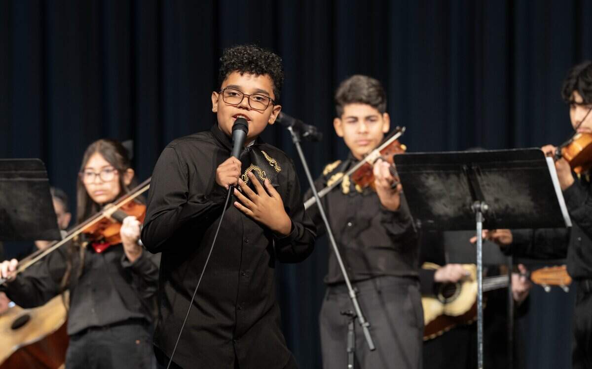Matthew Moran sings a solo during the mariachi camp concert on the fourth and final day of the camp. During the other songs he played the guitarrón. Moran will be an eighth-grader at Mayberry Middle School.