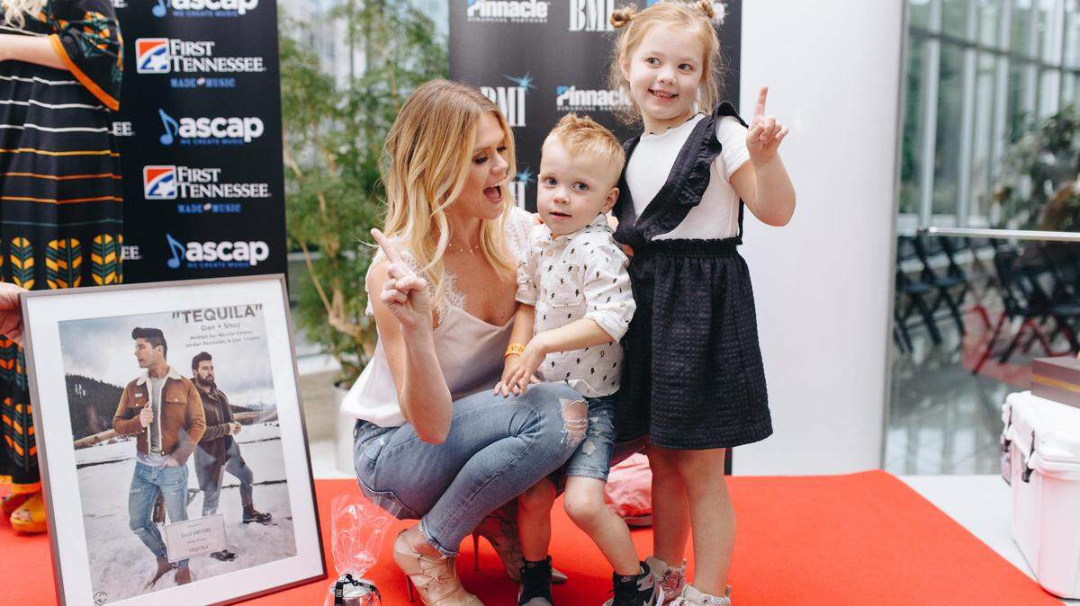 Nicolle Galyon and her two children at a Nashville party to celebrate Dan + Shay’s “Tequila” reaching No. 1 on the Billboard Hot Country charts earlier this year. She co-wrote the song.