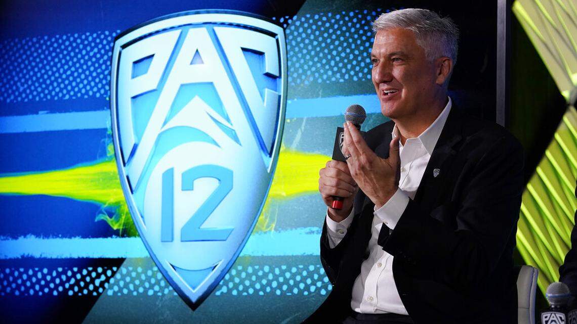 Pac-12 Commissioner George Kliavkoff fields questions during the Pac-12 Conference NCAA college football Media Day Tuesday, July 27, 2021, in Los Angeles. (AP Photo/Marcio Jose Sanchez)