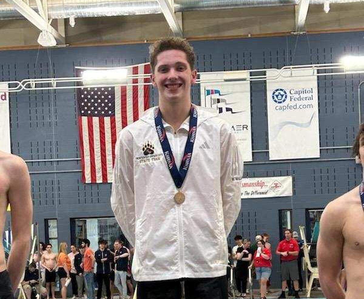 Northwest senior Brock Wallace after winning the Class 6A title in the backstroke.