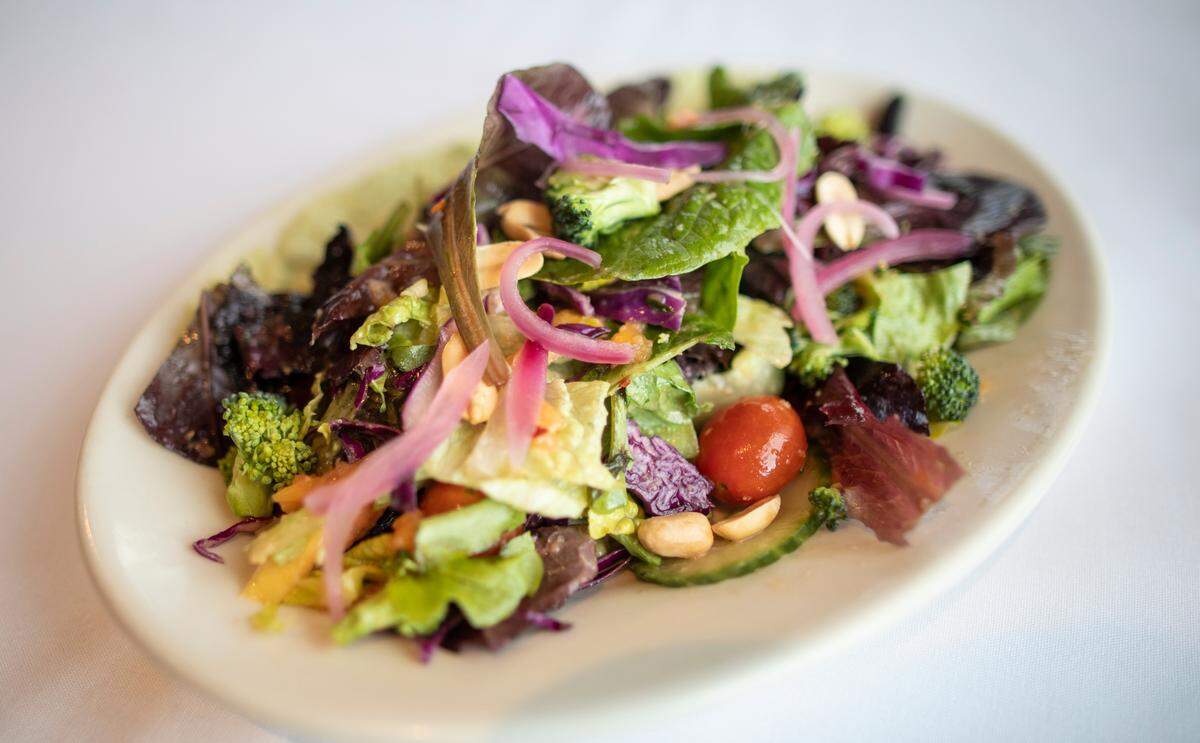 The Thai Peanut Salad on the new Greystone Restaurant menu includes green papaya, salted peanuts, whopped avocado and a peanut vinaigrette.