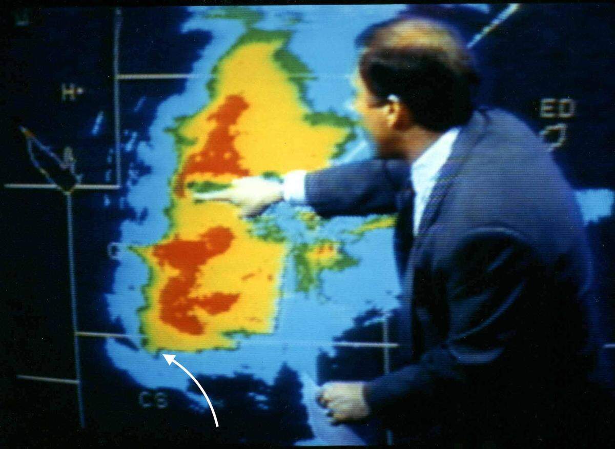 Mike Smith points to a hook echo associated with the Goddard tornado at about 5:47 p.m. on April, 26, 1991. At the same time, there was a tornado near Conway Springs and a second hook there (shown by the arrow), which produced the Wichita-Andover Tornado.