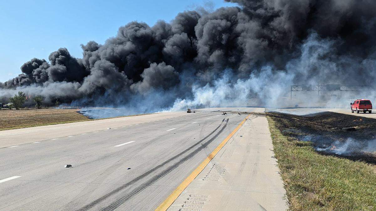 A large building fire southwest of Newton has closed off a portion of U.S. 50 on Wednesday