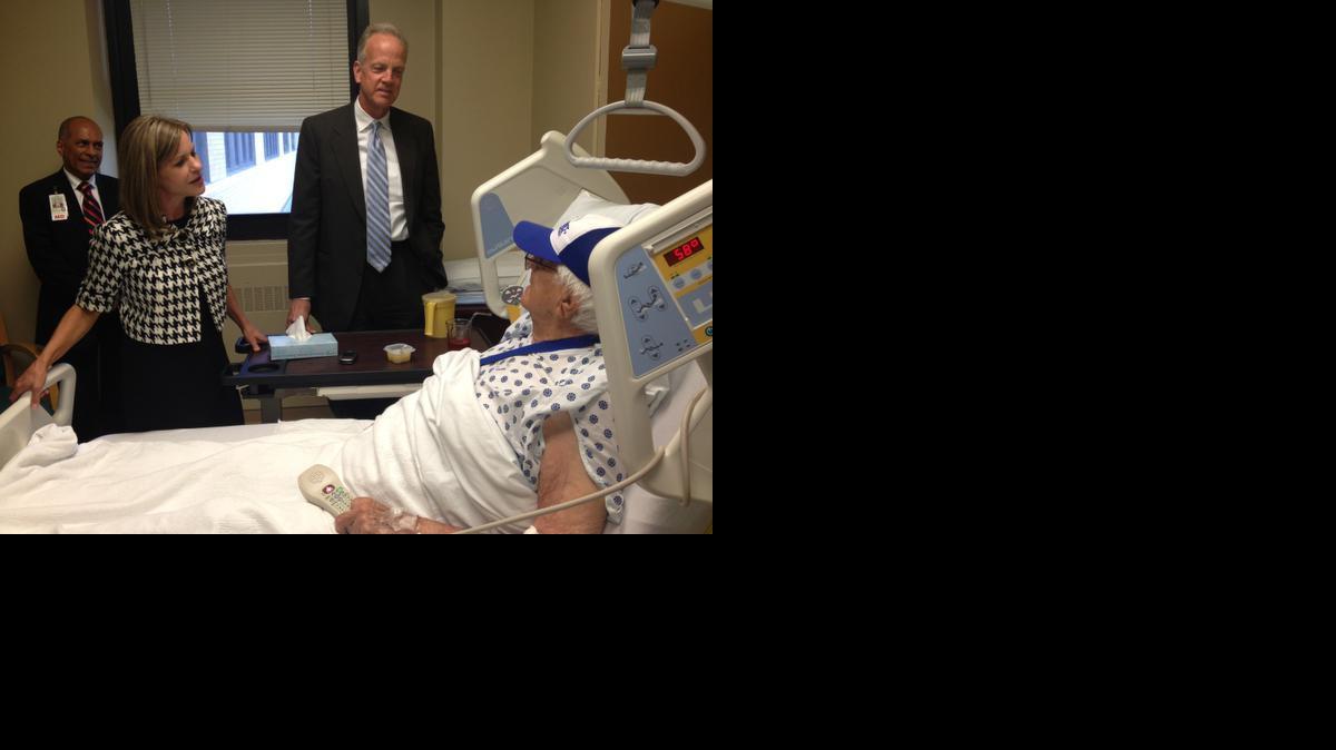 U.S. Rep. Lynn Jenkins and U.S. Sen. Jerry Moran visit with World War II veteran Bob Brown at the Colmery-O’Neil VA Medical Center in Topeka on Friday.

