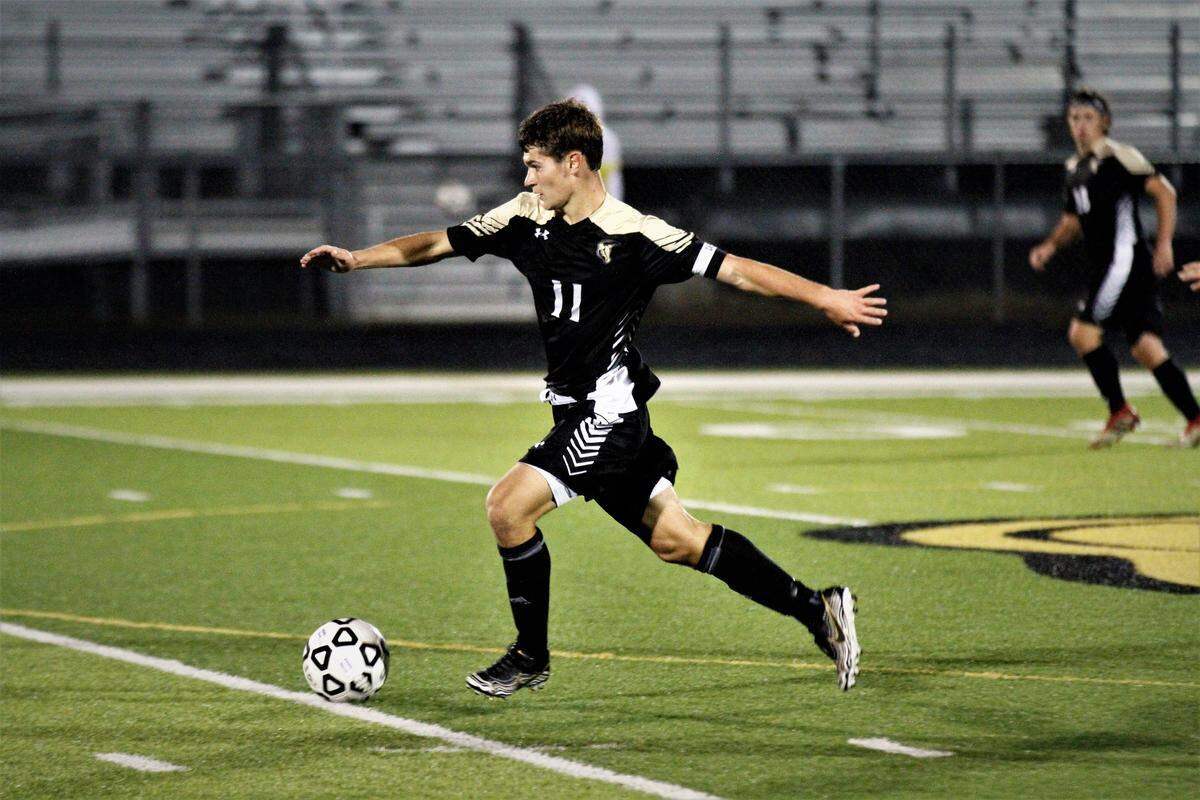 Maize South senior Bryce Bowman takes a touch during the Mavericks’ 2-1 double overtime regional championship victory over Eisenhower on Thursday night. (Oct. 25, 2018)
