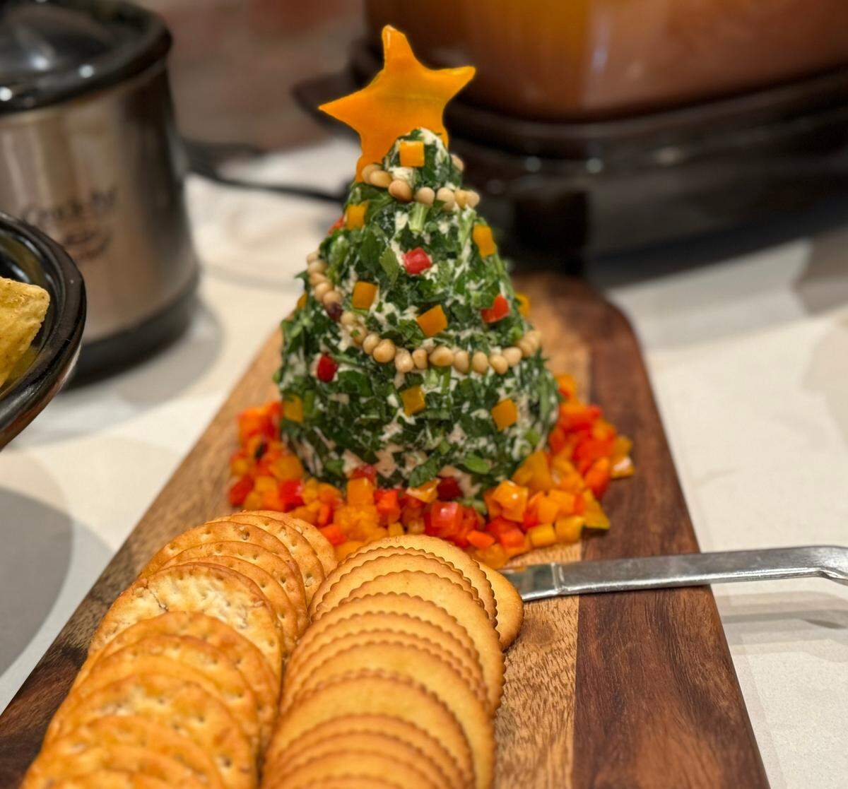 This Christmas Tree cheese ball was fun to make and brought joy to all three parties I made it for.