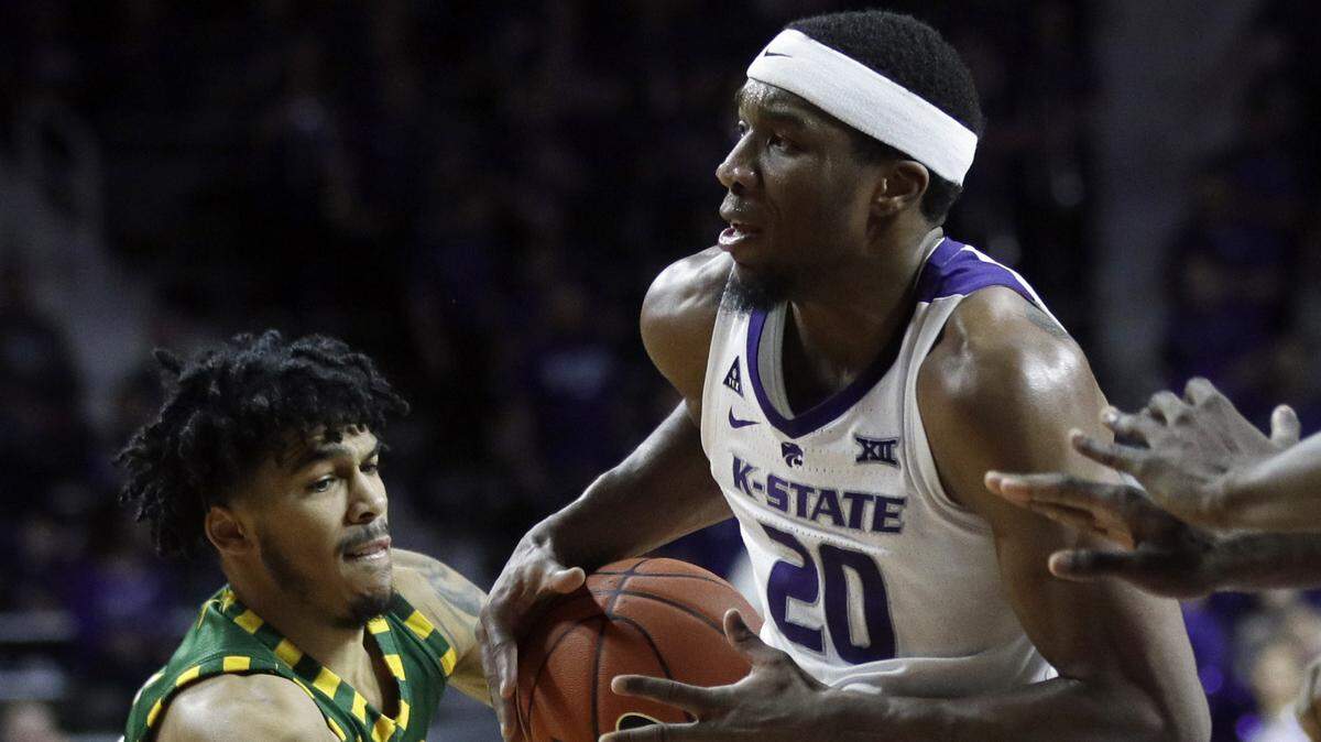George Mason guard Otis Livingston II, left, steals the ball from Kansas State forward Xavier Sneed (20) during the second half of an NCAA college basketball game in Manhattan, Kan., Saturday, Dec. 29, 2018. (AP Photo/Orlin Wagner)