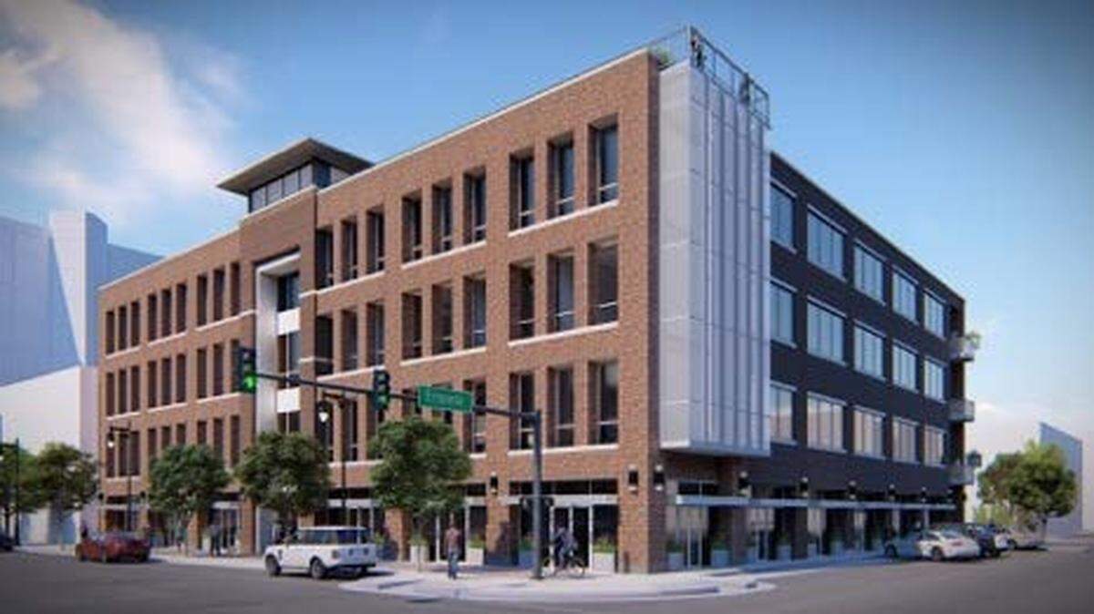 This illustration shows the four-story, 75,000-square-foot building that will replace Mead’s Corner and its parking lot at Douglas and Emporia.