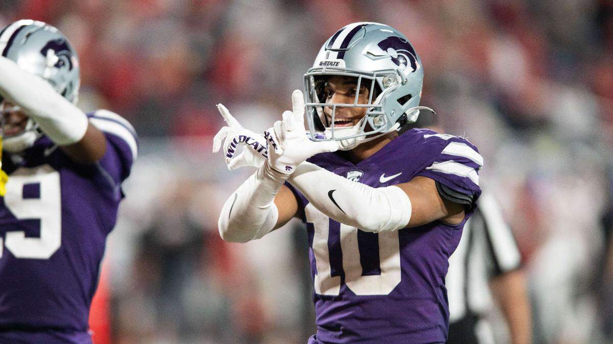 Kansas State cornerback Jacob Parrish (10) celebrates an interception against NC State in the fourth quarter at Camping World Stadium on Dec. 28, 2023.