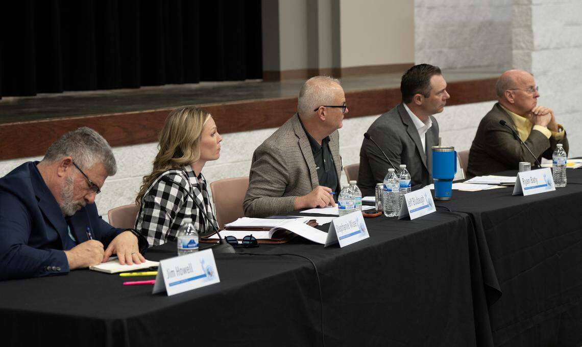 Sedgwick County officials listen as a stream of people speak about the potential for data centers in the county.