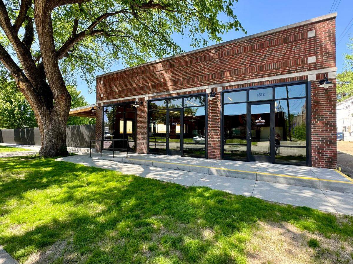 Kris and Traci Withrow turned an old service garage at 1312 E. English into a big new dog park and bar called Bars & Brews ICT. It opens on Friday.
