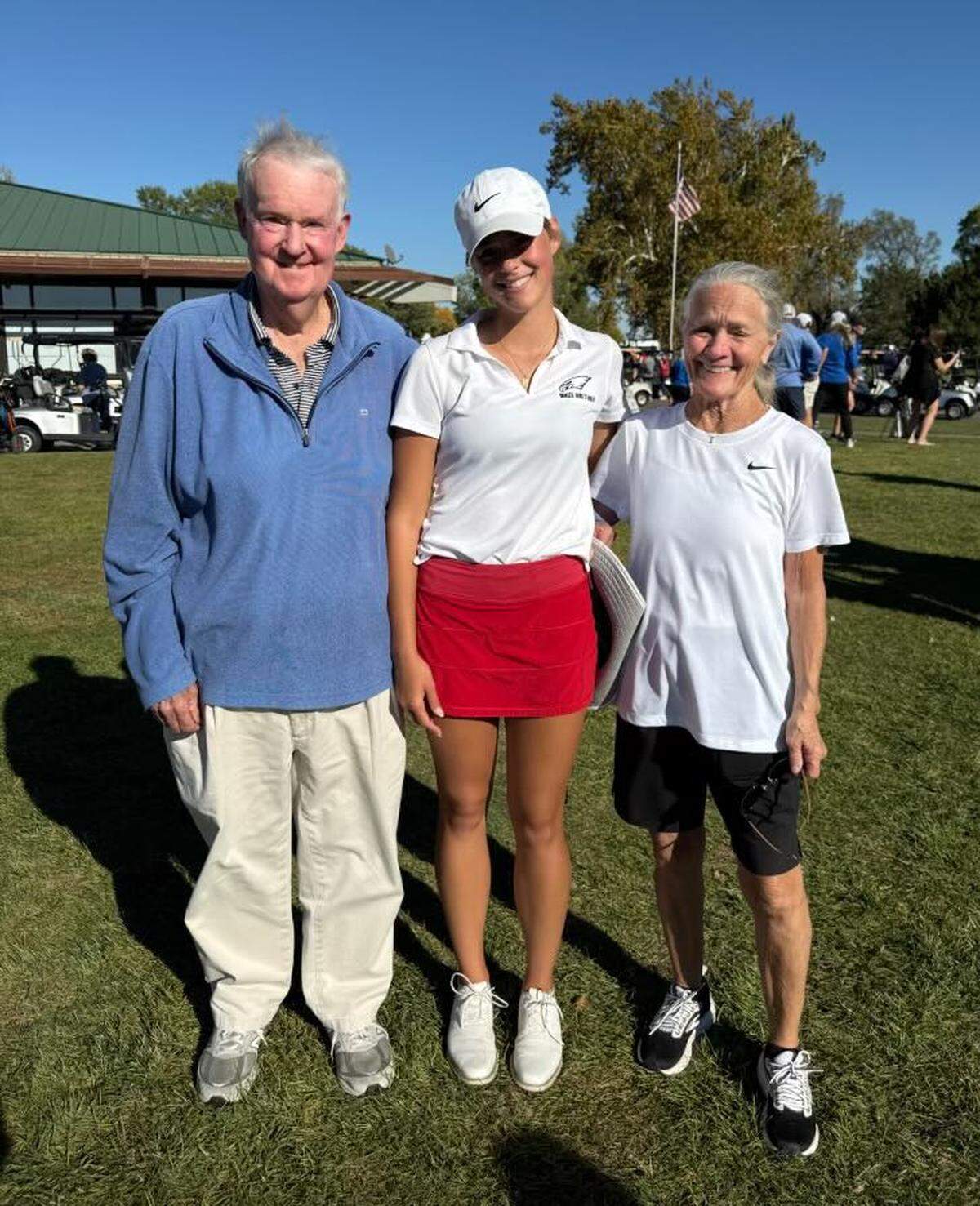 Maize senior Kinslea Jones poses for a picture with her grandparents, who include Wichita golfing legend Grier Jones.