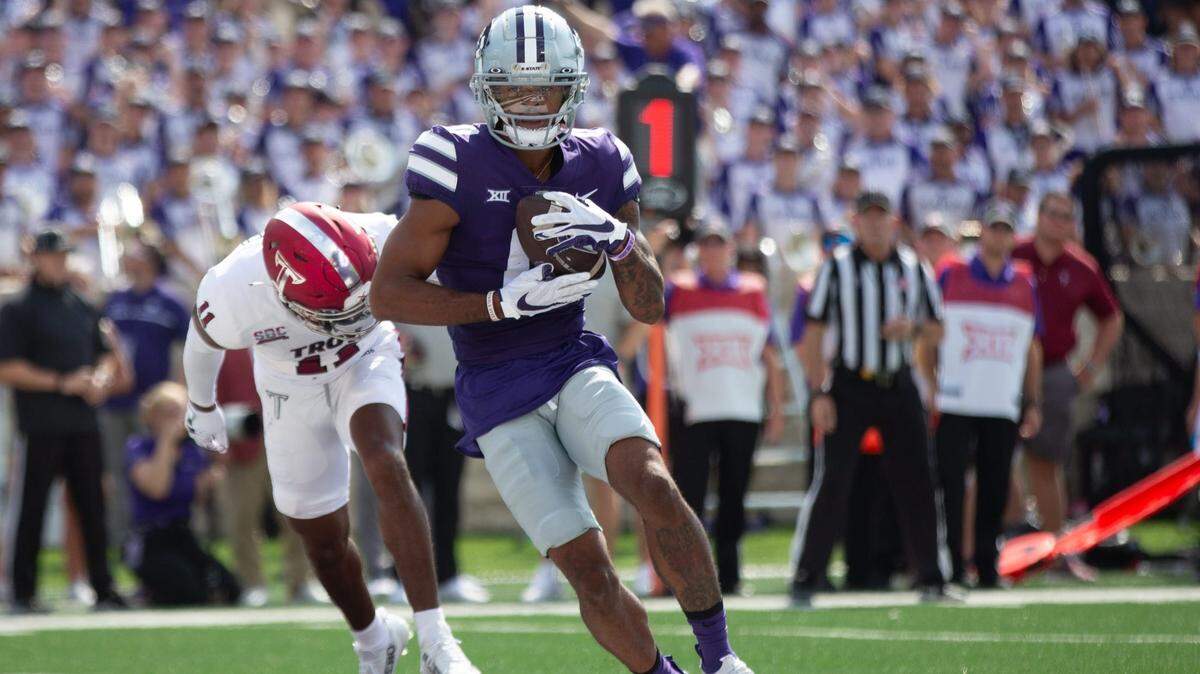 Kansas State sophomore senior wide receiver Jadon Jackson (0) catches a pass to score a touchdown early in the first quarter against Troy during Saturday’s game inside Bill Snyder Family Stadium.