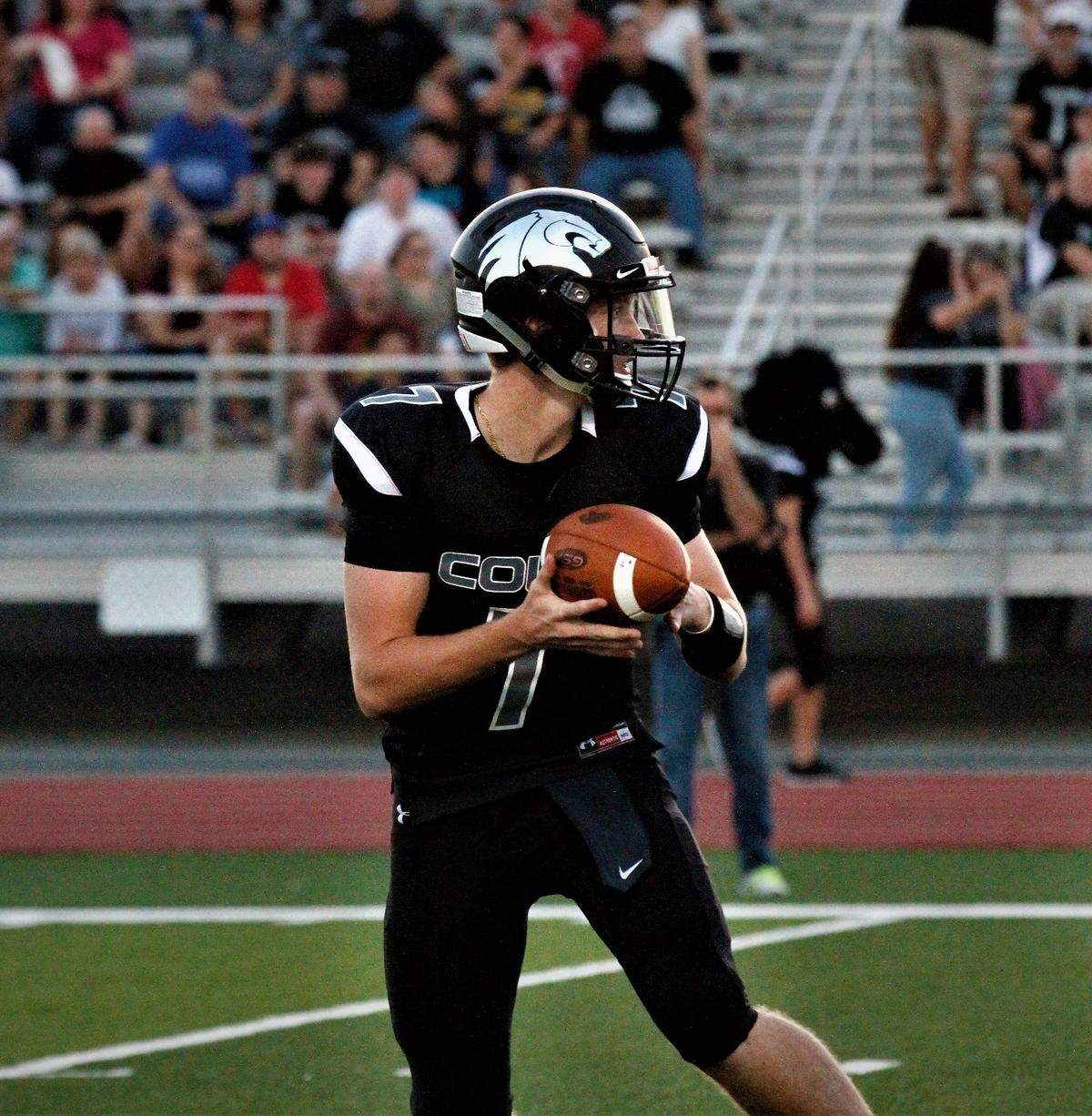 Campus senior quarterback Evan Kruse threw for six touchdowns Friday agianst Hutchinson.