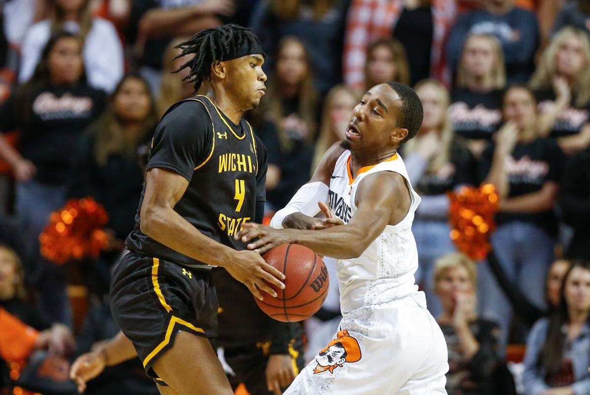 Wichita State’s Ricky Council IV steals the ball Oklahoma State’s Bryce Thompson late in the second half.