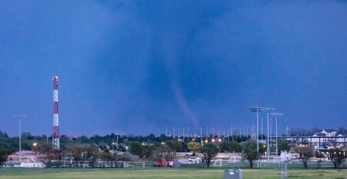 A tornado can be seen passing though Andover from K-96 on Friday night.