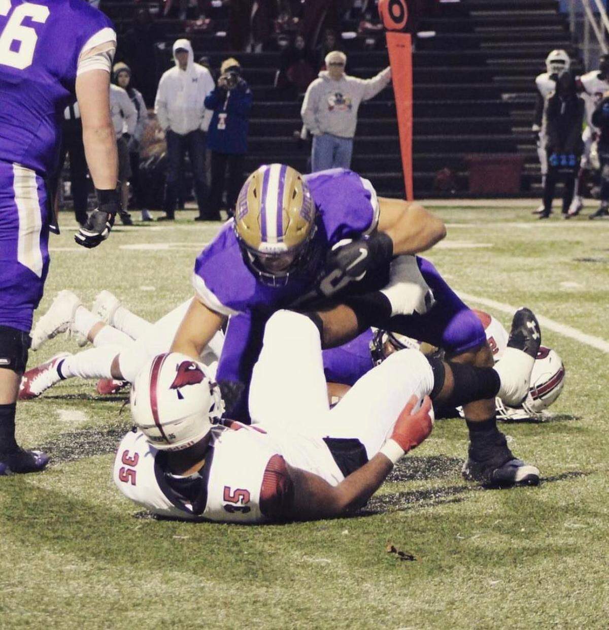Jeremiah Crawford finishes a pancake block during his playing days on the Butler football team.