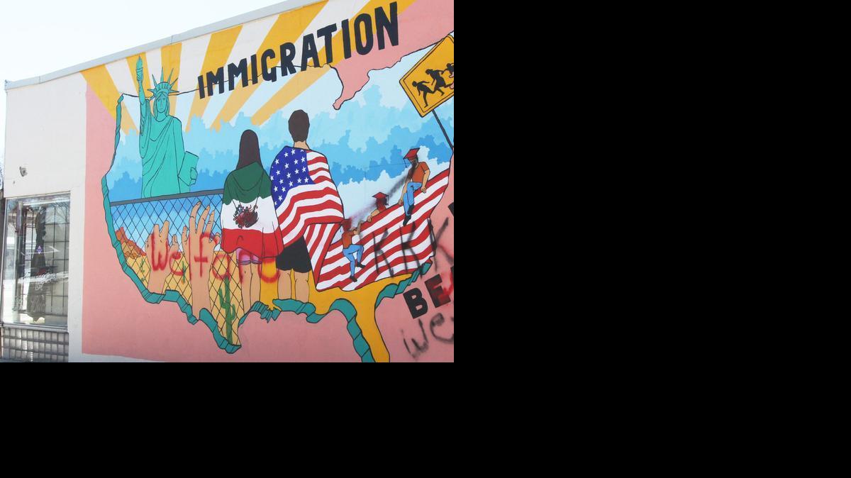 Racist graffiti has been spray-painted on this mural at 21st Street and Park Place. Similar graffiti was found in an alley in Delano on West Douglas. (Feb. 13, 2014)

