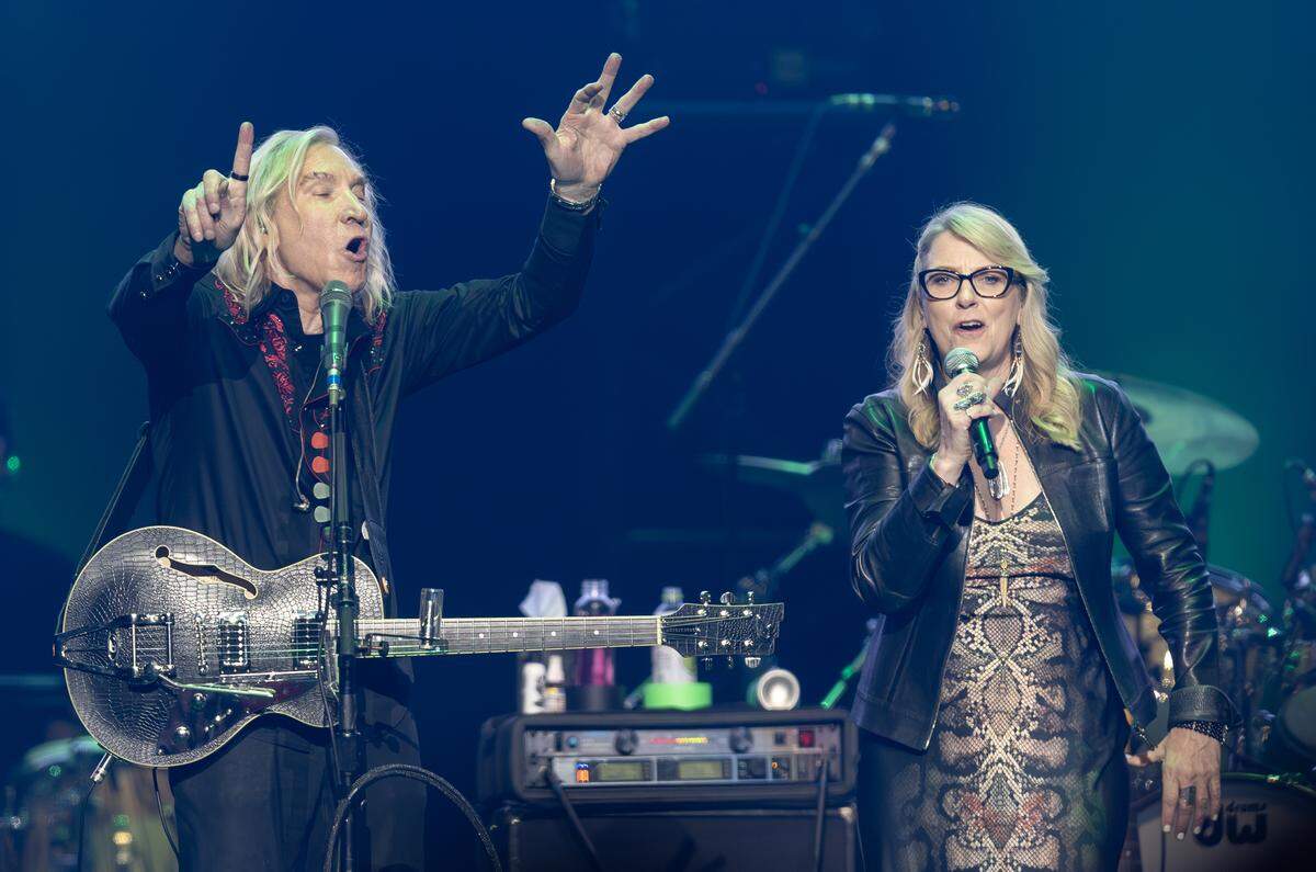 Joe Walsh performs his classic song “Life’s Been Good” with Susan Tedeschi at Walsh’s VetsAid concert at Intrust Bank Arena on Saturday night. The benefit concert raises money for local and regional veteran organizations.
