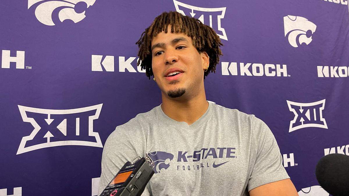 Kansas State wide receiver Keagan Johnson speaks with reporters in Manhattan.