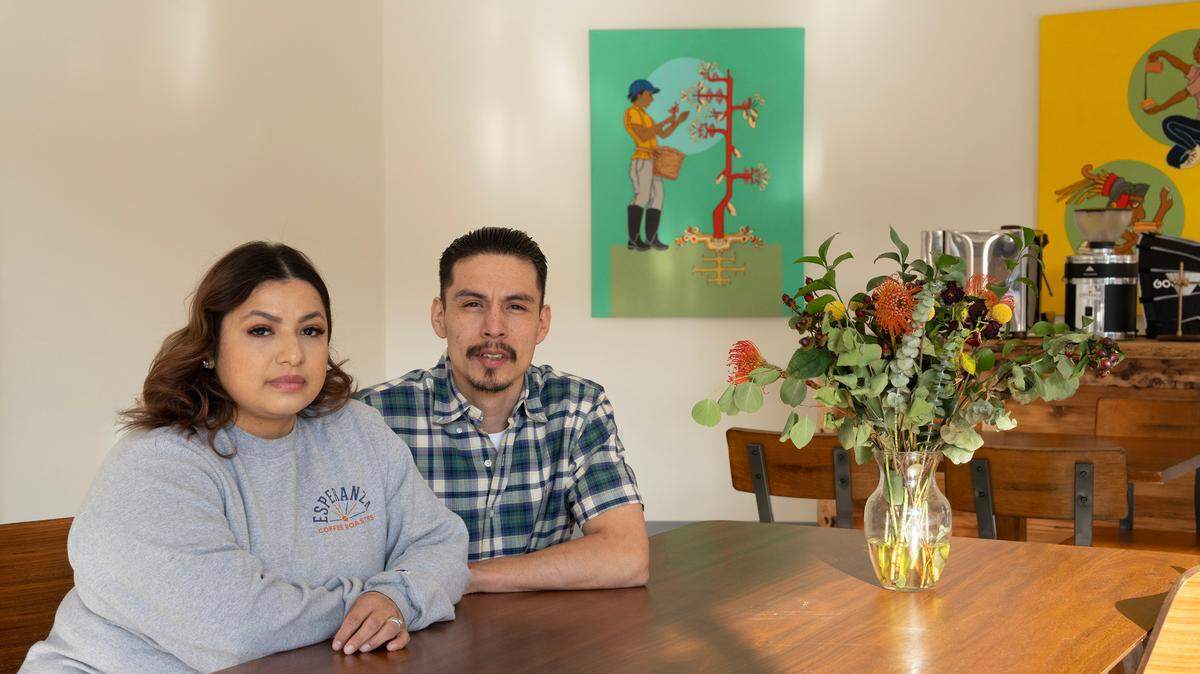 Flor Vanessa Pineda Olguin and her husband, Oscar Pineda, sit in their newly expanded Las Adelitas Cafe at the Lux, which includes a slow bar for coffees that take more time.