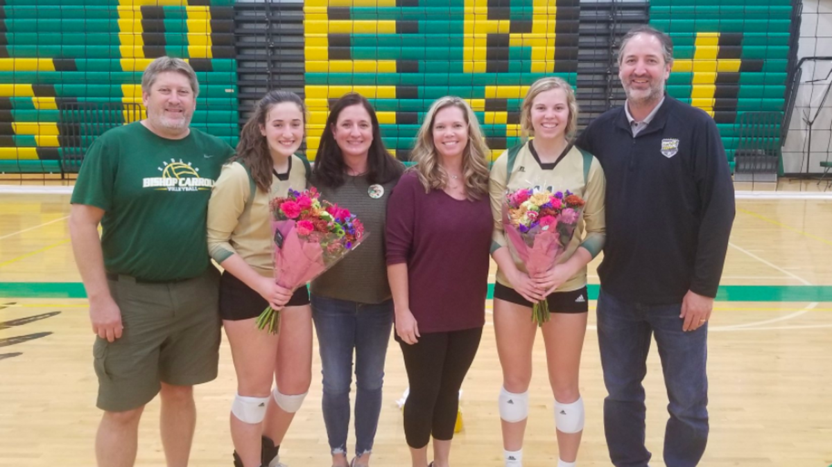 Riley Daugherty (left) is joined by her parents, Rick and Julie Daugherty, and Ella Larkin (right) is joined by her parents, Jennifer and Rick Larkin.