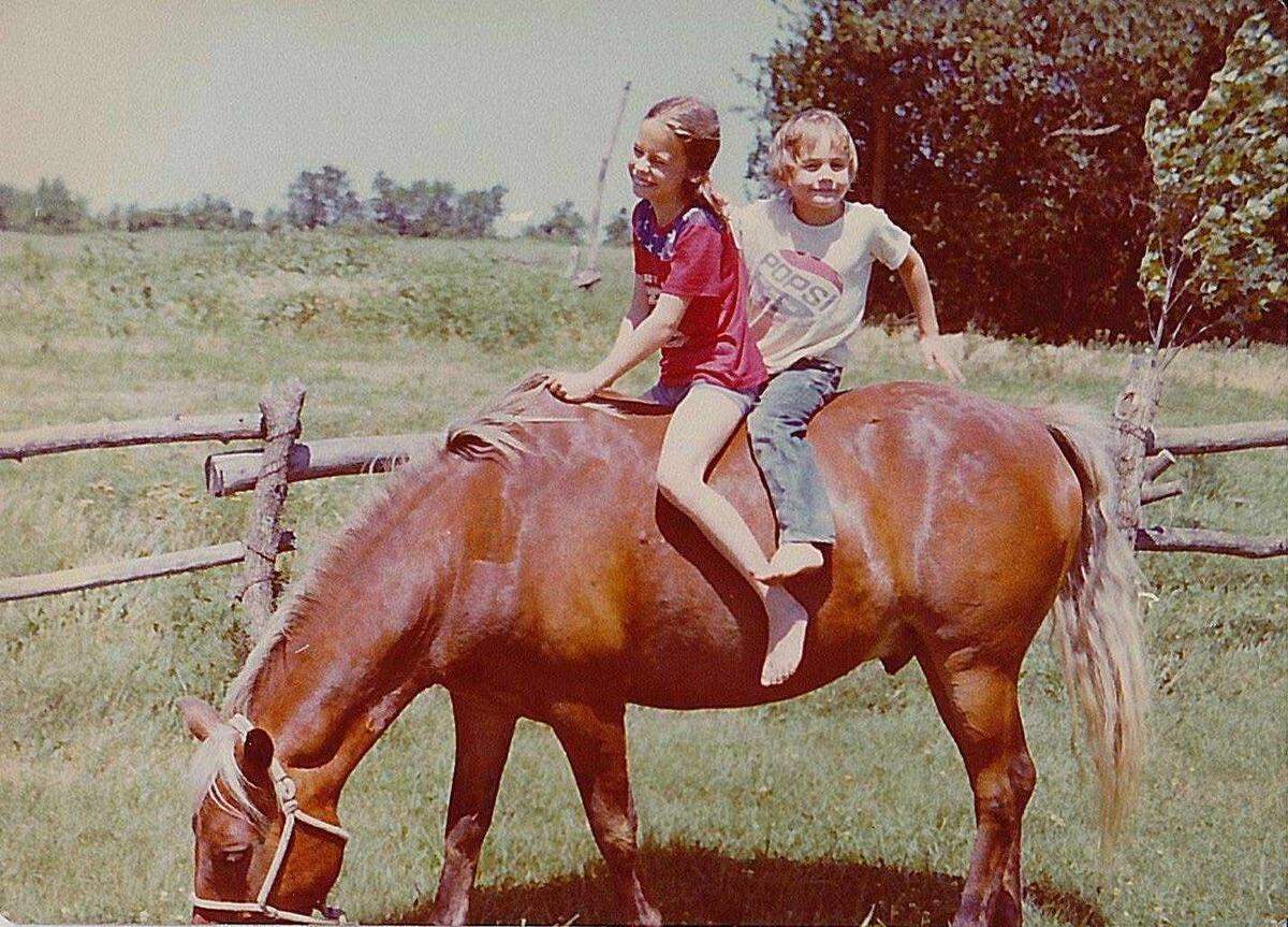 Farrell Hoy Jenab and her brother, Josh Hoy, riding his first horse, Rebel, when she was around 10 and he was around 8. Josh Hoy had his hand hovering over an area that, if touched, would make Rebel buck, Jenab said.