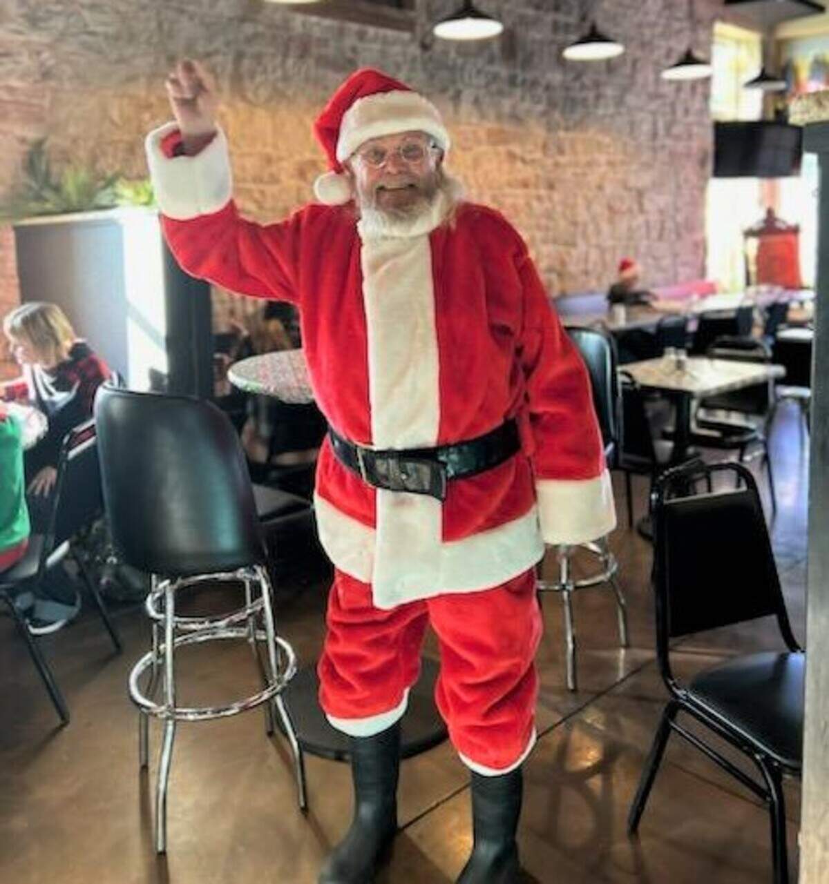 Michael Epperson Sr. dressed up as Santa Claus for a breakfast with Santa event in December at a Caldwell restaurant. He was found shot dead Jan. 6 in his west Wichita home.